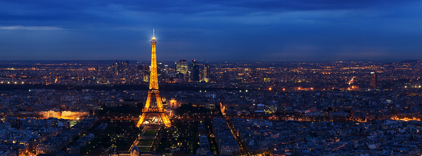 Capa para Facebook com foto panorâmica noturna de Paris mostrando a Torre Eiffel